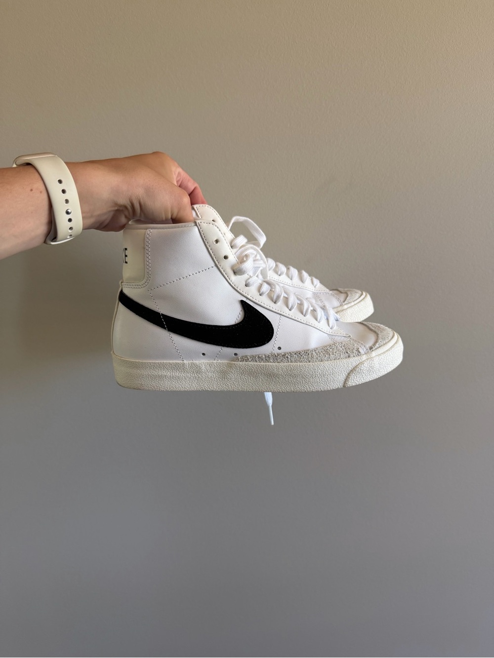 Nike High-Top Sneaker in White with Black Swoosh